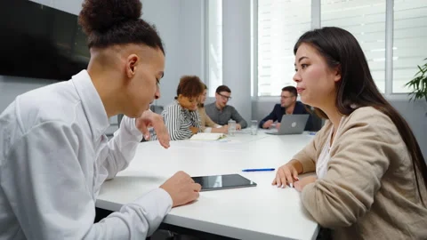 Startup team analyzing company statistics on tablet Stock Footage 164552155