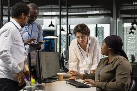 Startup team developing software, analyzing performance during QA testing Stock Photos