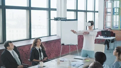 The startup team is testing a new technology - managing the drone through Stock Footage 108183198