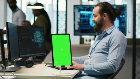 Startup technician using isolated screen tablet, developing AI models Stock Footage 313015180
