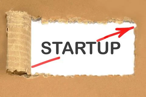 Startup text on a torn cardboard with a red arrow indicating a quick start fr Foto stock