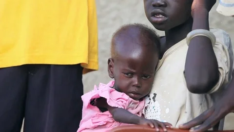 Starving child in South Sudan Stock Footage