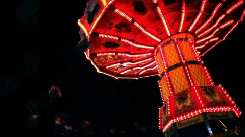 State Fair Carousel Swing Spins at Night Stock Footage 22411224