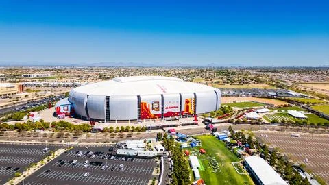 State Farm Stadium is a multi-purpose retractable roof stadium in Glendale,.. Stock Photos