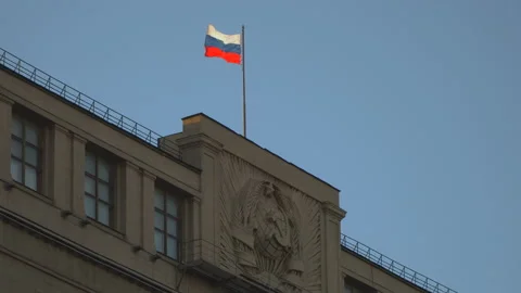 State flag of the Russian Federation over the State Duma Stock Footage 90273398