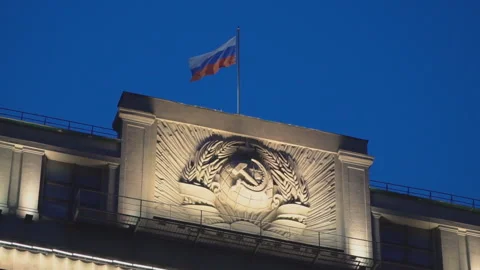 State flag of the Russian Federation over the State Duma, slow motion Stock Footage 94633892
