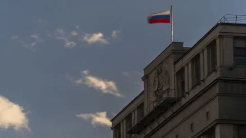 State flag of the Russian Federation over the State Duma Stock Footage 108435301