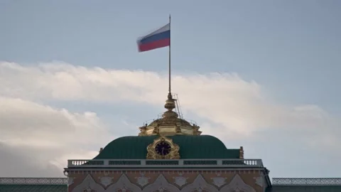 State flag of the Russian Federation over the Grand Kremlin Palace, the cerem Stock Footage 132929565