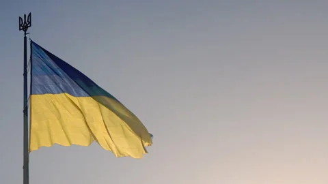 State flag of Ukraine. Slow motion of a large Ukrainian flag fluttering in the Stock Footage 259906311