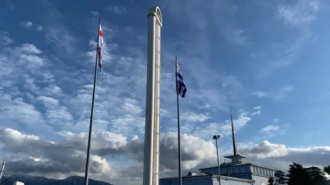 State flags of Georgia flutter in the wind Stock Footage 168642543
