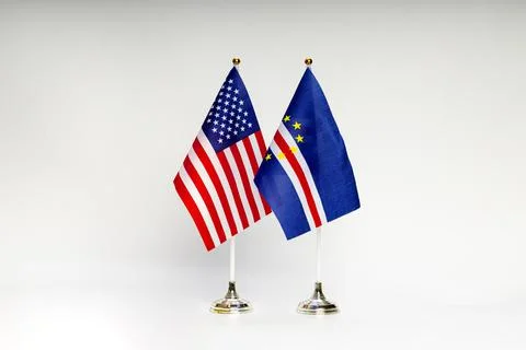 State flags of the USA and Cape Verde on a light background. Stock Photos