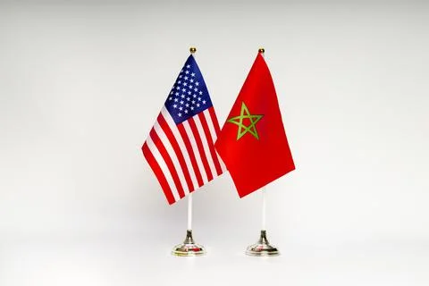 State flags of the USA and Morocco on a light background. Stock Photos