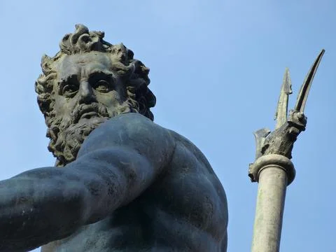 State of Neptune with the trident, closeup. Fountain of Neptune. Bologna, Italy Stock Photos