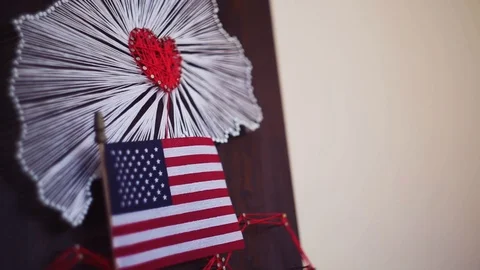 State string art. State of the country with a heart. Flag of the United States Stock Footage 108595007