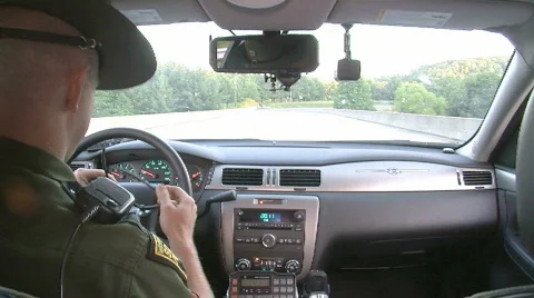 State Trooper Driving in Cruiser (HD) c 스톡 동영상 710571