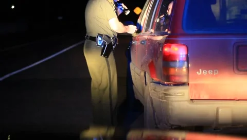 State Trooper Makes Traffic Stop at Night Stock Footage