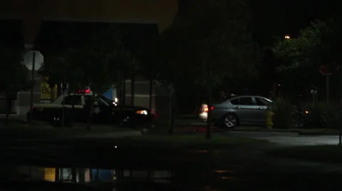 State trooper pulls over a vehicle at night 스톡 동영상 25852170