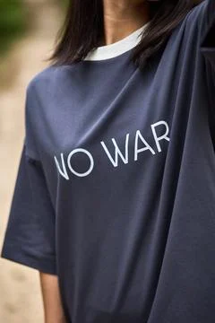 Statement Shirt With No War Message, Promoting Peace Through Fashion, Graph.. Stock Photos