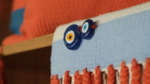Static 4K Macro Shot of Nazar Boncuğu Evil Eye Bead with Bokeh Background Stock Footage 327857469