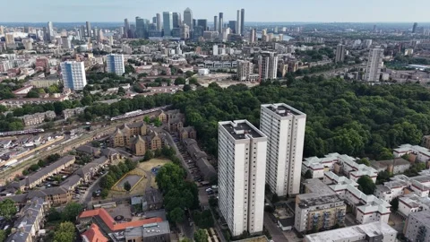 Static Aerial Drone Shot of Mile End Towers and Canary Wharf Skyline, London Stock-Footage 344867103