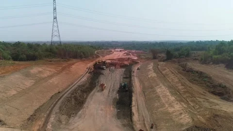 Static aerial drone view of excavators and dump trucks on earthwork site Stock Footage 346197682