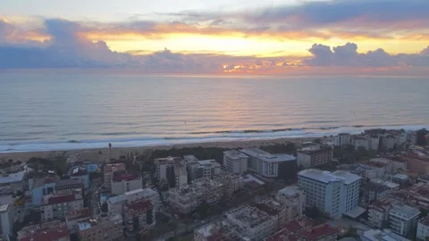 Static Aerial Hover Over Alanya City and Cleopatra Beach at Golden Hour Stock Footage 327459424