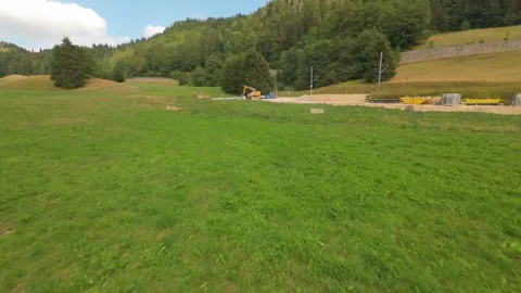Static Aerial Hover Over Quiet Green Field In Switzerland Stock Footage 341829801