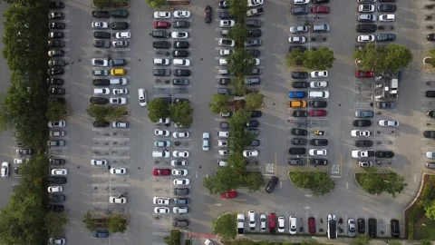 Static Aerial Shot of Busy Parking Lot Traffic at Golden Hour Stock Footage 342201658