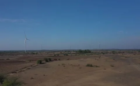 Static Aerial Shot of Electrical Substation Equipment Installed on Barren Land Stock Footage 342489079
