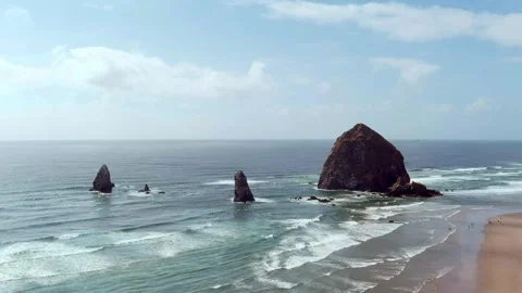 Static aerial shot of Haystack Rock in Cannon Beach, Oregon, USA. Stock Footage 311582013