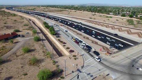 Static aerial shot of a traffic overpass intersection loaded with traffic Stock Footage 116612909