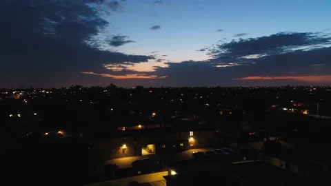 Static aerial view above a quiet neighborhood in San Diego at dusk Vídeo Stock 96184468