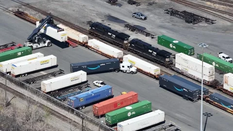 Static aerial view of Amazon Prime trailer truck at Jersey City rail yard Vídeo Stock 344597037