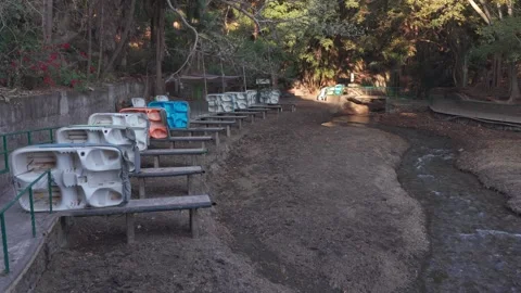 Static aerial view of boats stranded in drought-affected river, Chapultepec Park Video stock 328263638