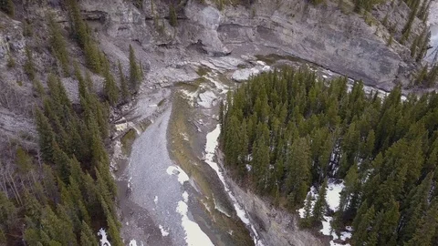 Static aerial view of a boreal river canyon in spring Stock Footage 107985914