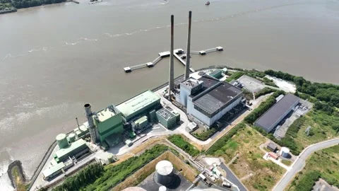 Static aerial view of electricity generation plant on the River Suir, Wexford Video stock 342105453
