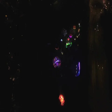 Static aerial view of a ffun fair at night. Stock Footage 69572437