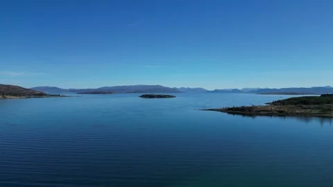 Static aerial view of lake and mountain landscape in Scotland 動画素材 334458648