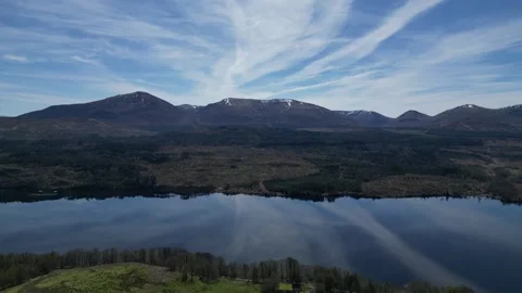 Static aerial view of lake and mountain landscape in Scotland 動画素材 334458796