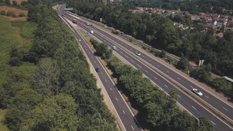 Static Aerial View of the M4 Motorway Near Cardiff, Wales with Moving Traffic Stock Footage 340086989
