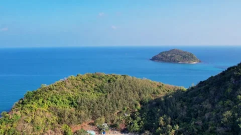 Static aerial view rising over a rocky cove on Nam Du Island 4K Stock Footage 333938995