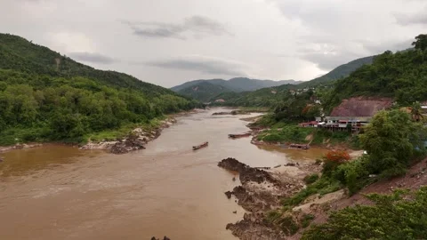 Static Aerial View of River Bend and Riverside Village, Luang Prabang Stock-Footage 347420902
