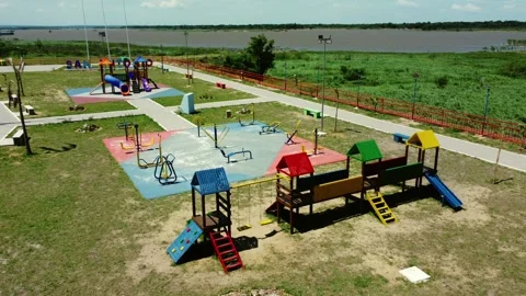 Static aerial view of riverside playground park in Paraguay 4K 스톡 동영상 334691776