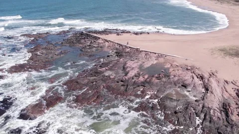 Static aerial view rock cliff and beach Stock Footage 219292715