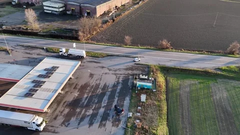Static aerial view of rural service station with rooftop solar panels in the Po Video stock 340604402