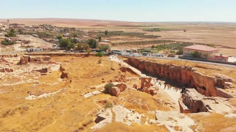 Static aerial view tourist groups walk around historical landmark antique cit Stock Footage 167240572