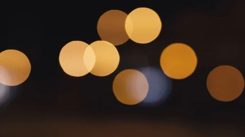 Static and moving light circles on dark background Stock Footage 102386772