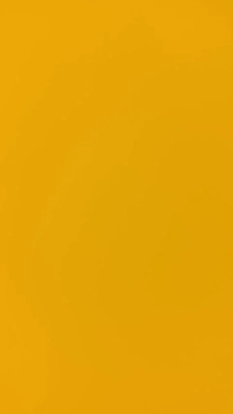 Static blurred uniform neon orange background for vertical video. Video stock 332564845
