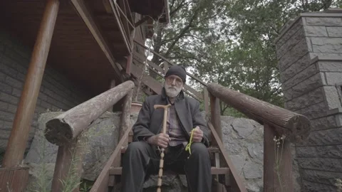Static Camera shot of a Muslim man praying with prayer beads slog2 Stock Footage 141875423
