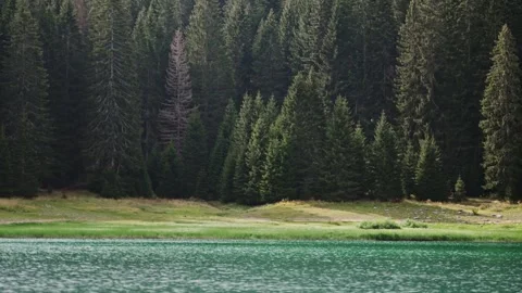 Static cinematic shot of a beautiful mountain lake Stock Footage 254394505